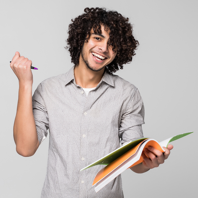 Young handsome curly student man with notebooks over isolated on white background